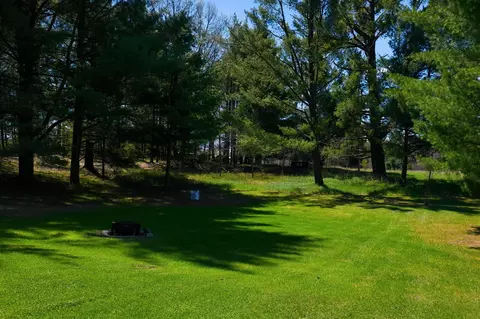Exterior - 7492 E Townline Lake Rd, Harrison, MI 48625 photo 6 of 9