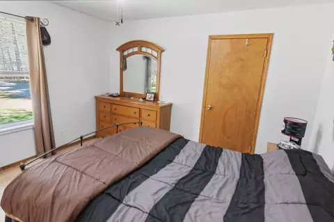 Bedroom - 7492 E Townline Lake Rd, Harrison, MI 48625 photo 1 of 4