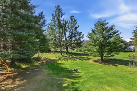 Exterior - 7492 E Townline Lake Rd, Harrison, MI 48625 photo 4 of 9