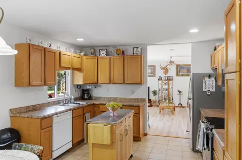 Kitchen - 7492 E Townline Lake Rd, Harrison, MI 48625 photo 2 of 3