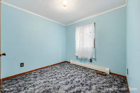 Bedroom - 1320 W Stanton Rd, Stanton, MI 48888 photo 2 of 2