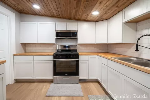 Kitchen - 415 N State Rd, Belding, MI 48809 photo 2 of 6