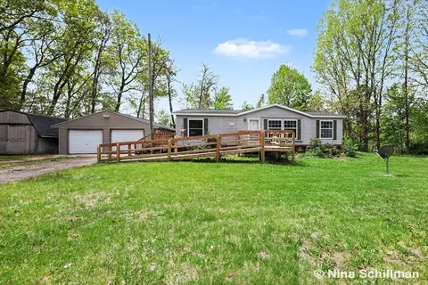 12150 Woodland Park Dr NE, Belding, MI 48809