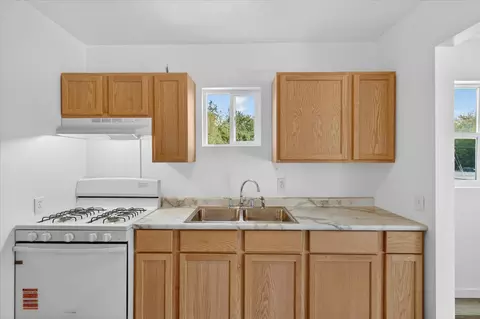 Kitchen - 1387 E Riverside Dr, Ionia, MI 48846 photo 4 of 6