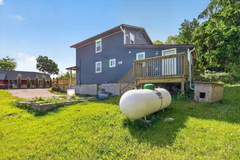Exterior - 1387 E Riverside Dr, Ionia, MI 48846 photo 7 of 9