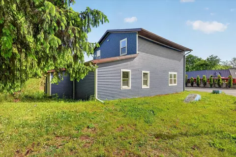 Exterior - 1387 E Riverside Dr, Ionia, MI 48846 photo 6 of 9