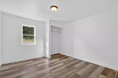 Bedroom - 1387 E Riverside Dr, Ionia, MI 48846 photo 5 of 12