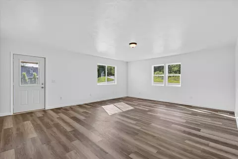 Living - 1387 E Riverside Dr, Ionia, MI 48846 photo 2 of 5