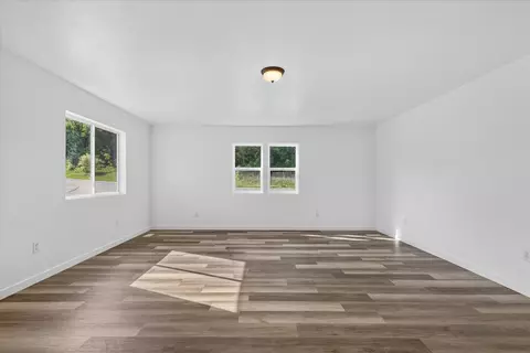 Living - 1387 E Riverside Dr, Ionia, MI 48846 photo 3 of 5