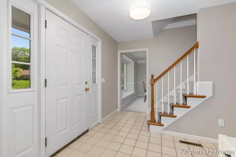 Entry Way - 7716 Kirkwall Dr SE, Ada, MI 49301 photo 1 of 2