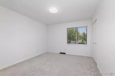 Bedroom - 7716 Kirkwall Dr SE, Ada, MI 49301 photo 3 of 5