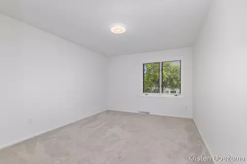 Bedroom - 7716 Kirkwall Dr SE, Ada, MI 49301 photo 4 of 5