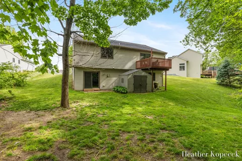 Exterior - 1663 Barnsley Ct SE, Lowell, MI 49331 photo 5 of 7