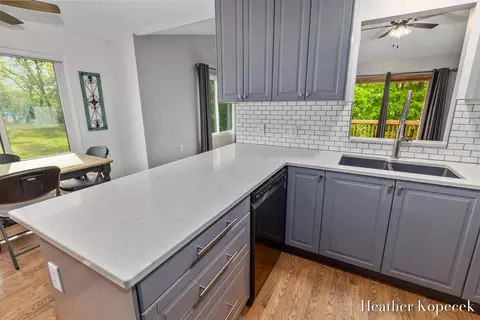 Kitchen - 1663 Barnsley Ct SE, Lowell, MI 49331 photo 2 of 4