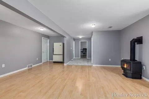 Living - 1663 Barnsley Ct SE, Lowell, MI 49331 photo 5 of 5