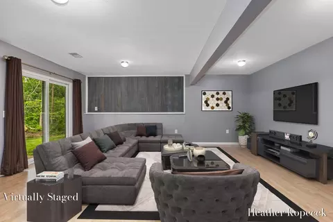 Living - 1663 Barnsley Ct SE, Lowell, MI 49331 photo 2 of 5