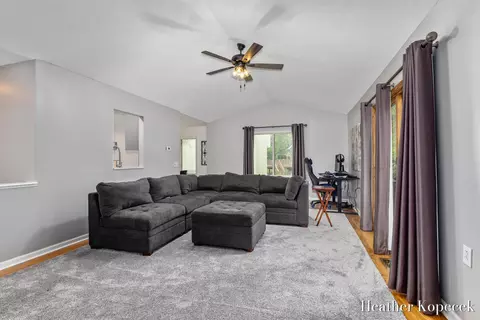 Living - 1663 Barnsley Ct SE, Lowell, MI 49331 photo 1 of 5