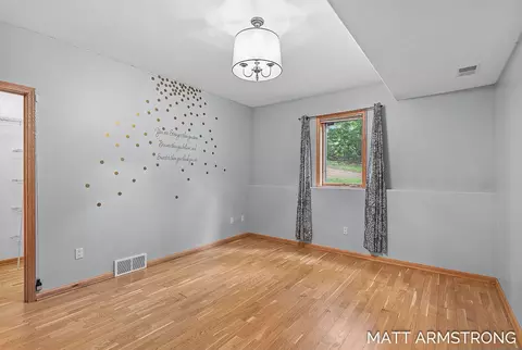 Bedroom - 2135 Hilltop View Dr, Dorr, MI 49323 photo 5 of 8