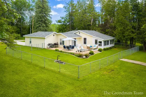 Exterior - 7170 Spring St, Alanson, MI 49706 photo 7 of 19