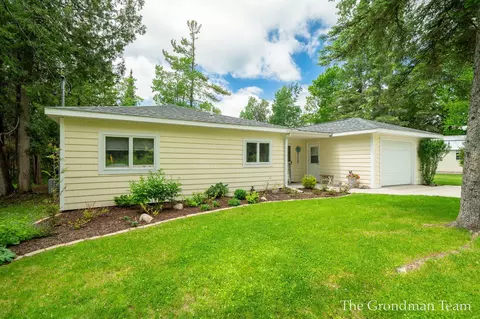 Exterior - 7170 Spring St, Alanson, MI 49706 photo 2 of 19
