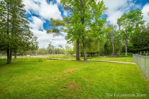 Exterior - 7170 Spring St, Alanson, MI 49706 photo 14 of 19