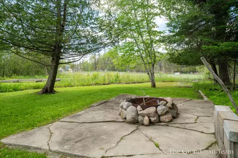 Exterior - 7170 Spring St, Alanson, MI 49706 photo 16 of 19