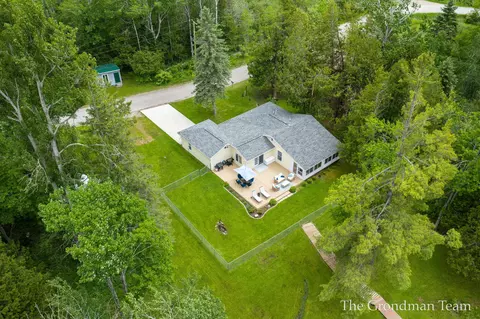 Exterior - 7170 Spring St, Alanson, MI 49706 photo 6 of 19