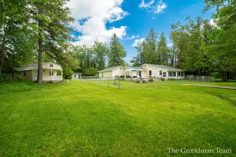 Exterior - 7170 Spring St, Alanson, MI 49706 photo 17 of 19