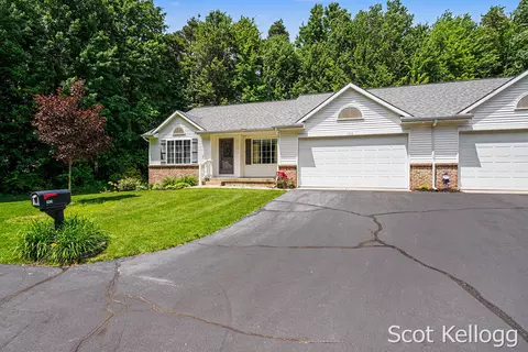 Exterior - 1923 Jack Pine Ct, Dorr, MI 49323 photo 2 of 4