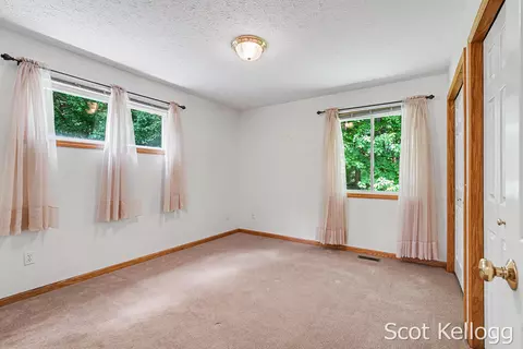 Bedroom - 1923 Jack Pine Ct, Dorr, MI 49323 photo 1 of 2