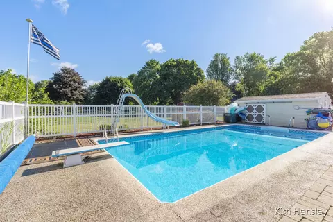 Exterior - 1594 Louva Ct, Belding, MI 48809 photo 5 of 13