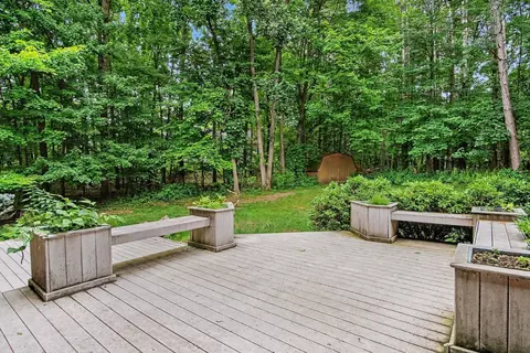 Exterior - 540 Roundtree Dr NE, Ada, MI 49301 photo 3 of 6