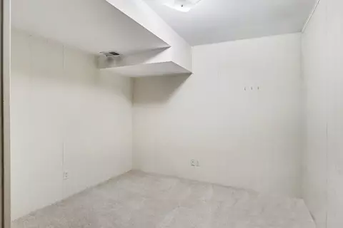 Bedroom - 540 Roundtree Dr NE, Ada, MI 49301 photo 7 of 8