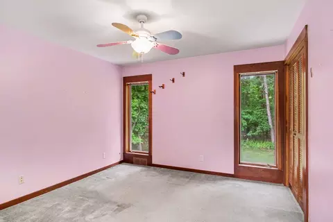 Bedroom - 540 Roundtree Dr NE, Ada, MI 49301 photo 5 of 8
