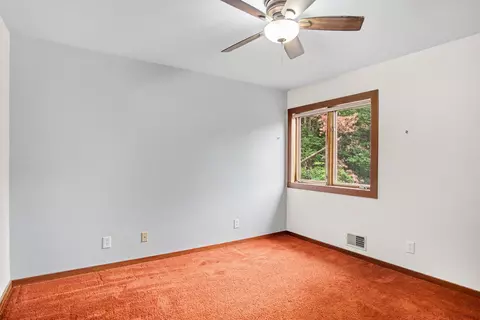 Bedroom - 540 Roundtree Dr NE, Ada, MI 49301 photo 4 of 8