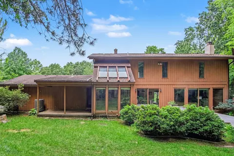 Exterior - 540 Roundtree Dr NE, Ada, MI 49301 photo 5 of 6