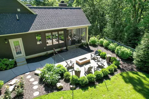 Exterior - 547 Roundtree Dr NE, Ada, MI 49301 photo 9 of 24