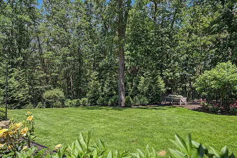 Exterior - 547 Roundtree Dr NE, Ada, MI 49301 photo 15 of 24