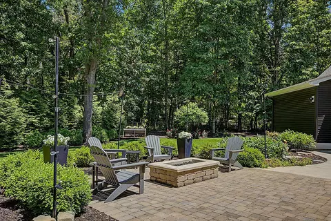 Exterior - 547 Roundtree Dr NE, Ada, MI 49301 photo 12 of 24