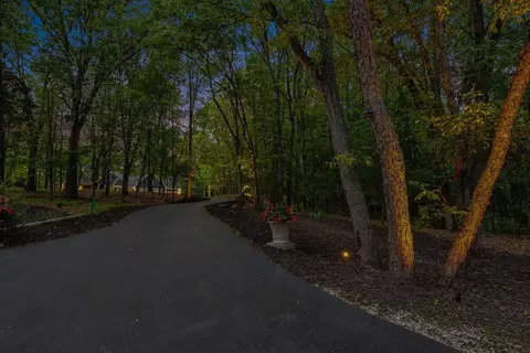 Exterior - 547 Roundtree Dr NE, Ada, MI 49301 photo 23 of 24