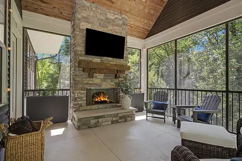 Exterior - 547 Roundtree Dr NE, Ada, MI 49301 photo 18 of 24