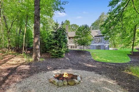 Exterior - 547 Roundtree Dr NE, Ada, MI 49301 photo 20 of 24