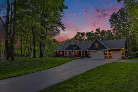 Exterior - 547 Roundtree Dr NE, Ada, MI 49301 photo 22 of 24