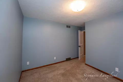 Bedroom - 1511 Springbrook Dr, Jenison, MI 49428 photo 6 of 6