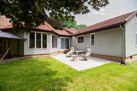 Exterior - 989 Mccabe Ave NE, Ada, MI 49301 photo 2 of 13