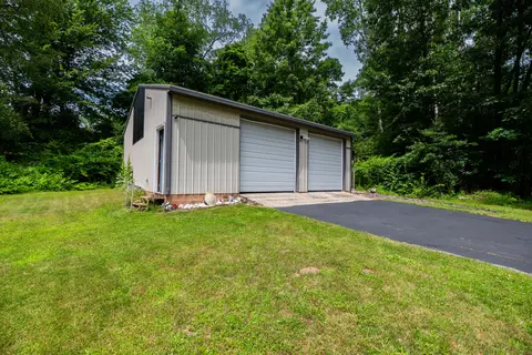 Exterior - 989 Mccabe Ave NE, Ada, MI 49301 photo 11 of 13