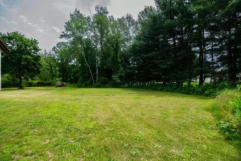 Exterior - 989 Mccabe Ave NE, Ada, MI 49301 photo 12 of 13