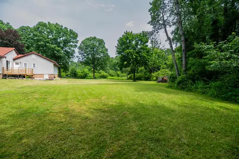 Exterior - 989 Mccabe Ave NE, Ada, MI 49301 photo 10 of 13