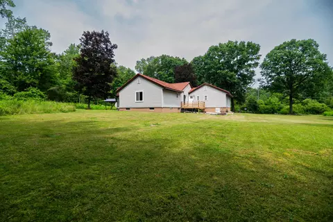 Exterior - 989 Mccabe Ave NE, Ada, MI 49301 photo 9 of 13