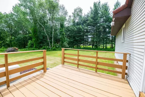 Exterior - 989 Mccabe Ave NE, Ada, MI 49301 photo 4 of 13